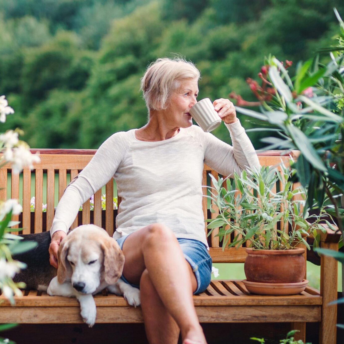 woman in a garden enjoying retirement