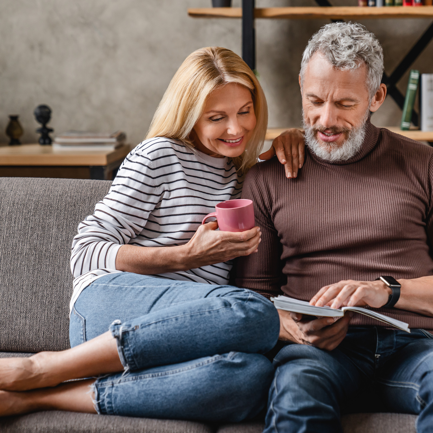 Couple smiling on the sofa