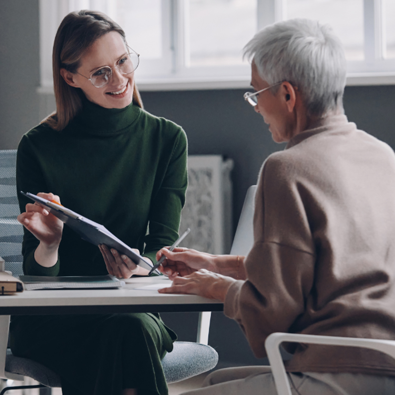 financial adviser helping client