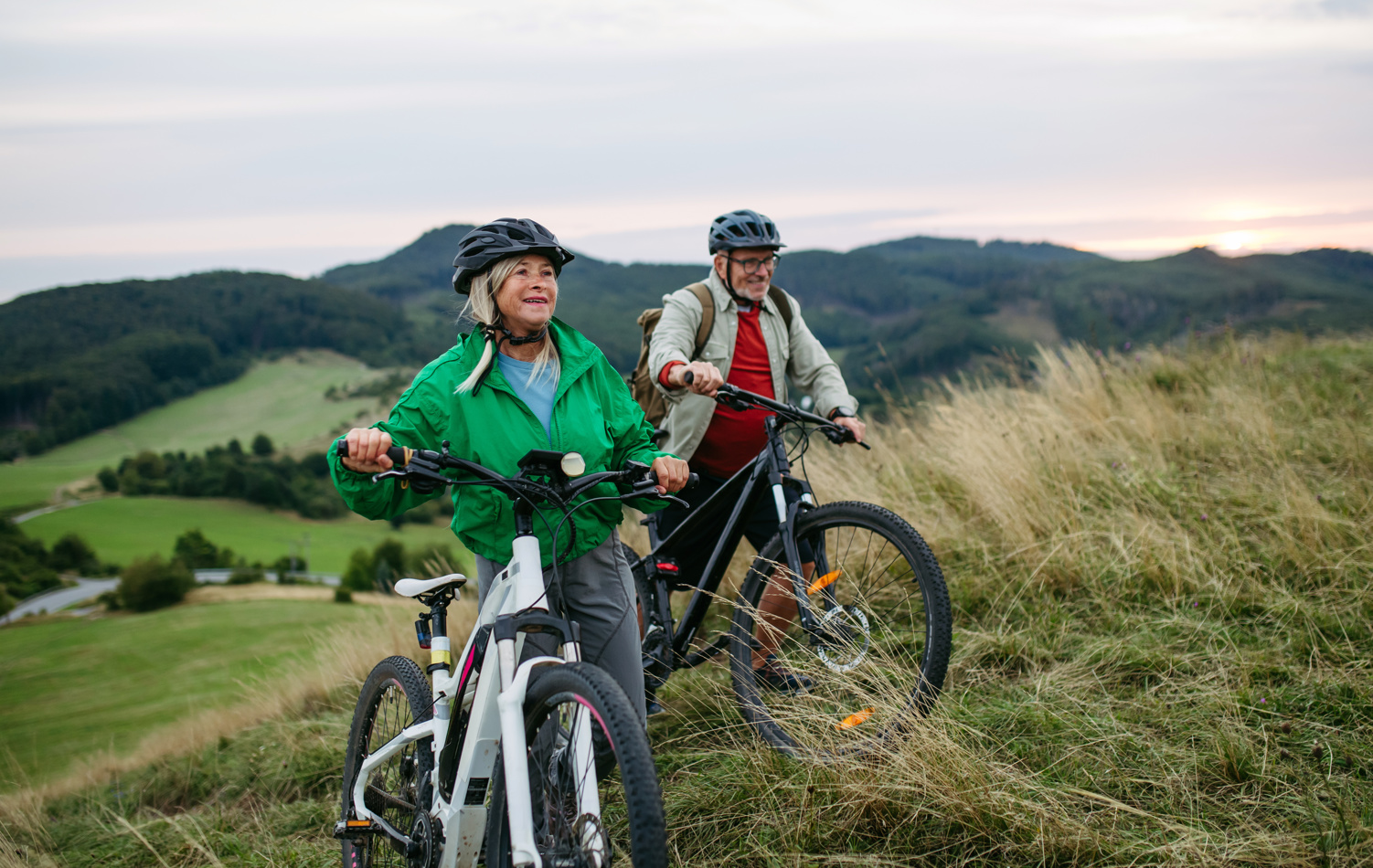 Retired couple enjoying cycling